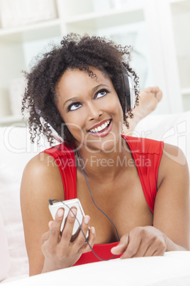 African American Girl Listening to MP3 Player Headphones