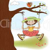 funny girl in a swing