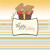 birthday greeting card with teddy bear and big gift box