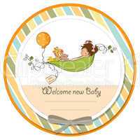 little girl siting in a pea been. baby announcement card