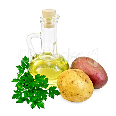 potatoes red and yellow  with a bottle of oil