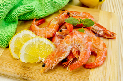 shrimps on board with lemon