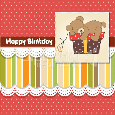 birthday greeting card with teddy bear and big gift box