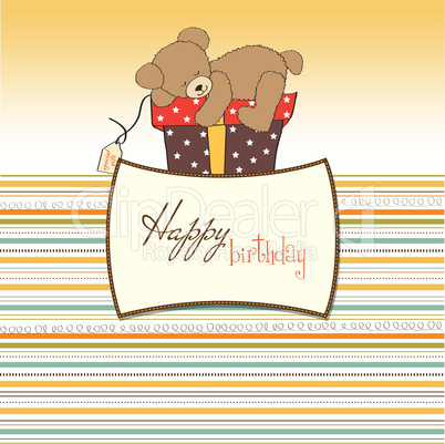 birthday greeting card with teddy bear and big gift box