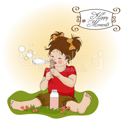 funny lovely little girl blowing soap bubbles