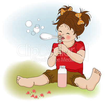 funny lovely little girl blowing soap bubbles
