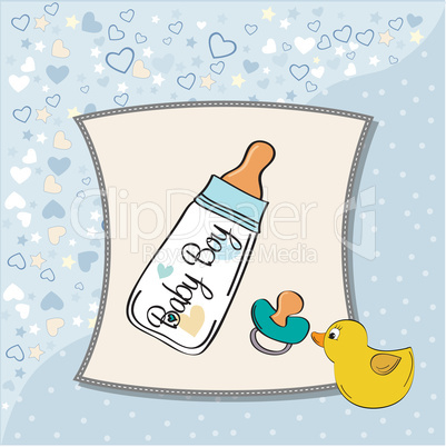 baby announcement card with milk bottle and pacifier