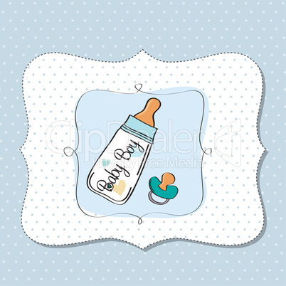 baby announcement card with milk bottle and pacifier