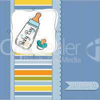 baby announcement card with milk bottle and pacifier