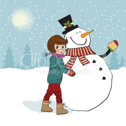 Cute little girl with snowman