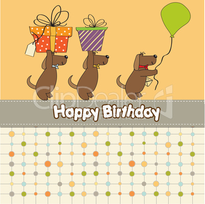 three dogs that offer a big gift. birthday greeting card