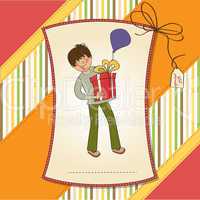 birthday card with boy and big gift box
