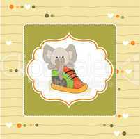 cute greeting card with an elephant hidden in a shoe