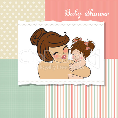 young mother holding a new baby girl