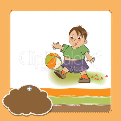 little boy playing ball