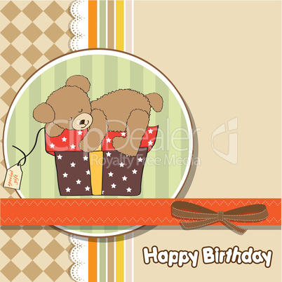 birthday greeting card with teddy bear and big gift box