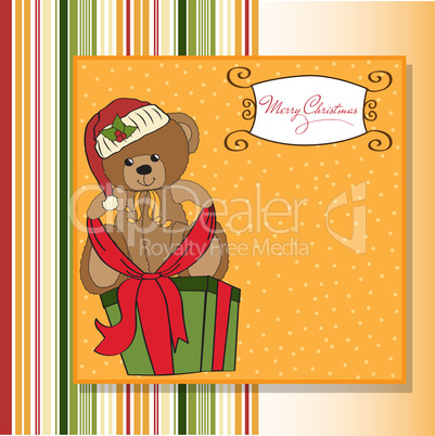 cute teddy bear with a big Christmas gift box