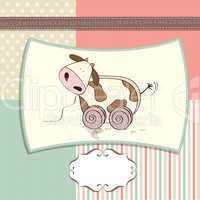 childish card with cute cow toy
