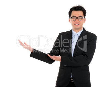 Asian business man hand showing blank space