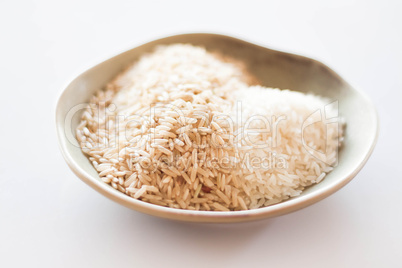 A mound of natural brown and white rice seeds