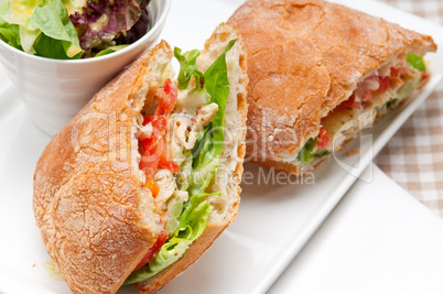 ciabatta panini sandwich with chicken and tomato