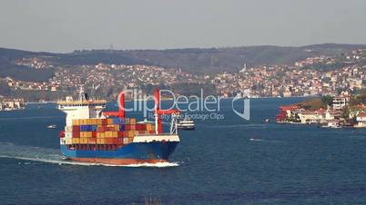 Container ship sailing into open sea