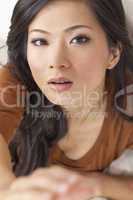 Beautiful Chinese Asian Woman Reaching to Camera