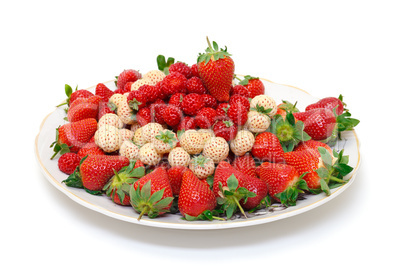 Ripe White and Red Strawberries on plate