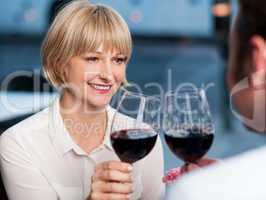 Couple toasting in a restaurant