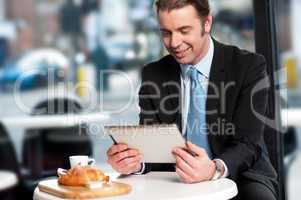 Business executive at open restaurant