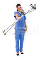 Sullen faced doctor displaying crutches