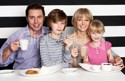 Family enjoying breakfast at a restaurant