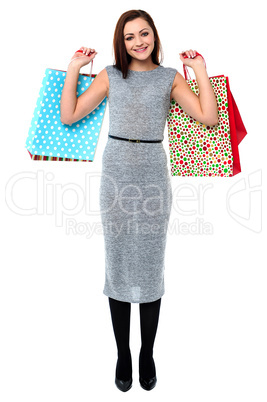 Trendy woman with shopping bags