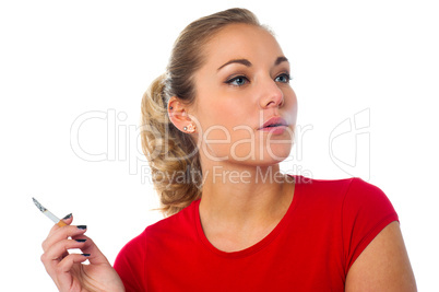 Young woman with cigarette in hand