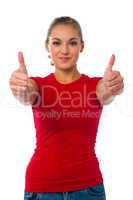 Girl showing double thumbs up
