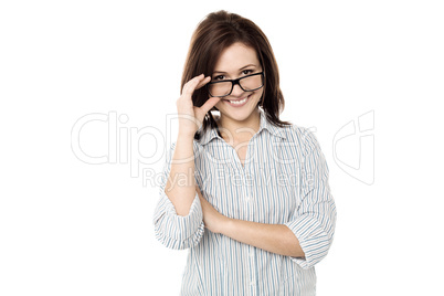 Cute woman adjusting her eyewear