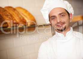Bakery owner dressed in chef's attire