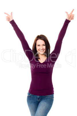 Victorious young woman celebrating her success