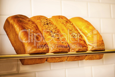 Freshly kneaded grain and white breads for sale