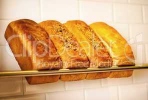 Freshly kneaded grain and white breads for sale