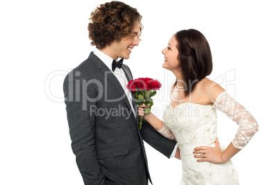 Girl flirting with her man, wedding concept.