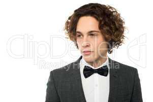 Sullen faced serious young groom