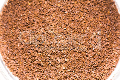 Red stones in a container