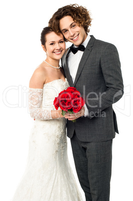 Beautiful new bridegroom smiles for the camera