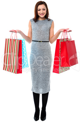 Portrait of a young shopaholic woman