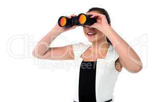 Lady looking through the binocular
