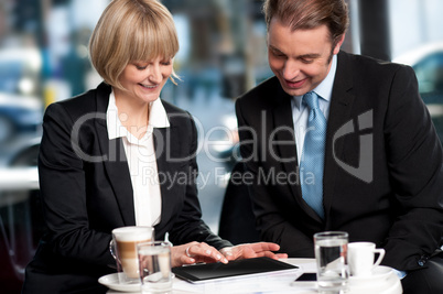 Corporates discussing business over a coffee