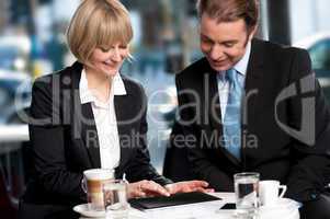 Corporates discussing business over a coffee