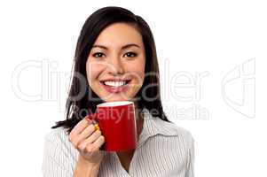 Woman enjoying coffee during work break