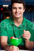 Young chap eating ice cream